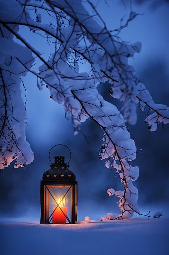 Candle lantern in the snow